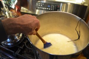 giving the curds a stir